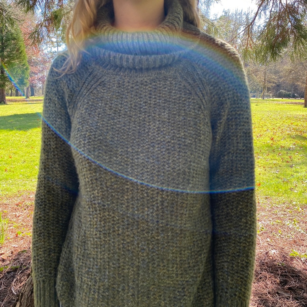 Cowl neck olive sweater.